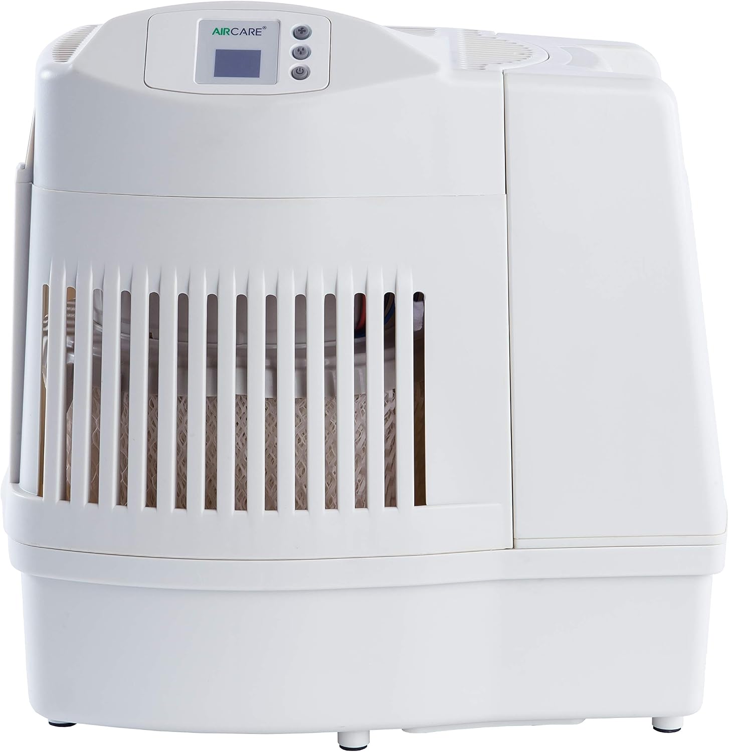Console-style whole house humidifier in a living room