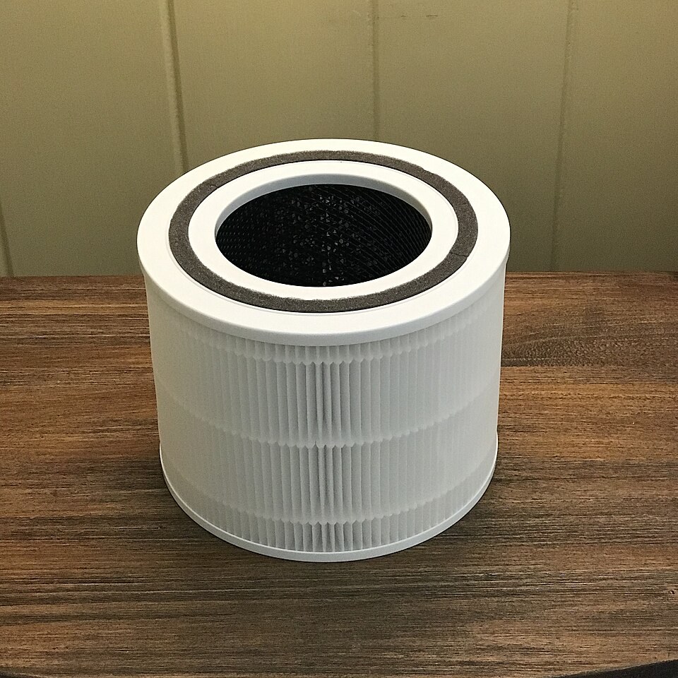 Circular HEPA filter with an activated carbon layer, the pleated mesh a true HEPA purifier forces air through